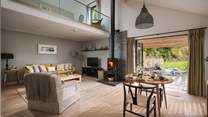 Open-plan living offers a spacious yet cosy space for romantic staycations 