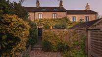 Deep in the Wiltshire countryside, this romantic cottage has been lovingly restored by its owner