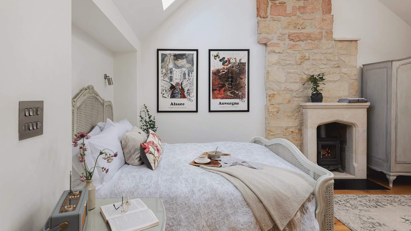 Featuring a characterful wood burning stove for cosy bedroom living...