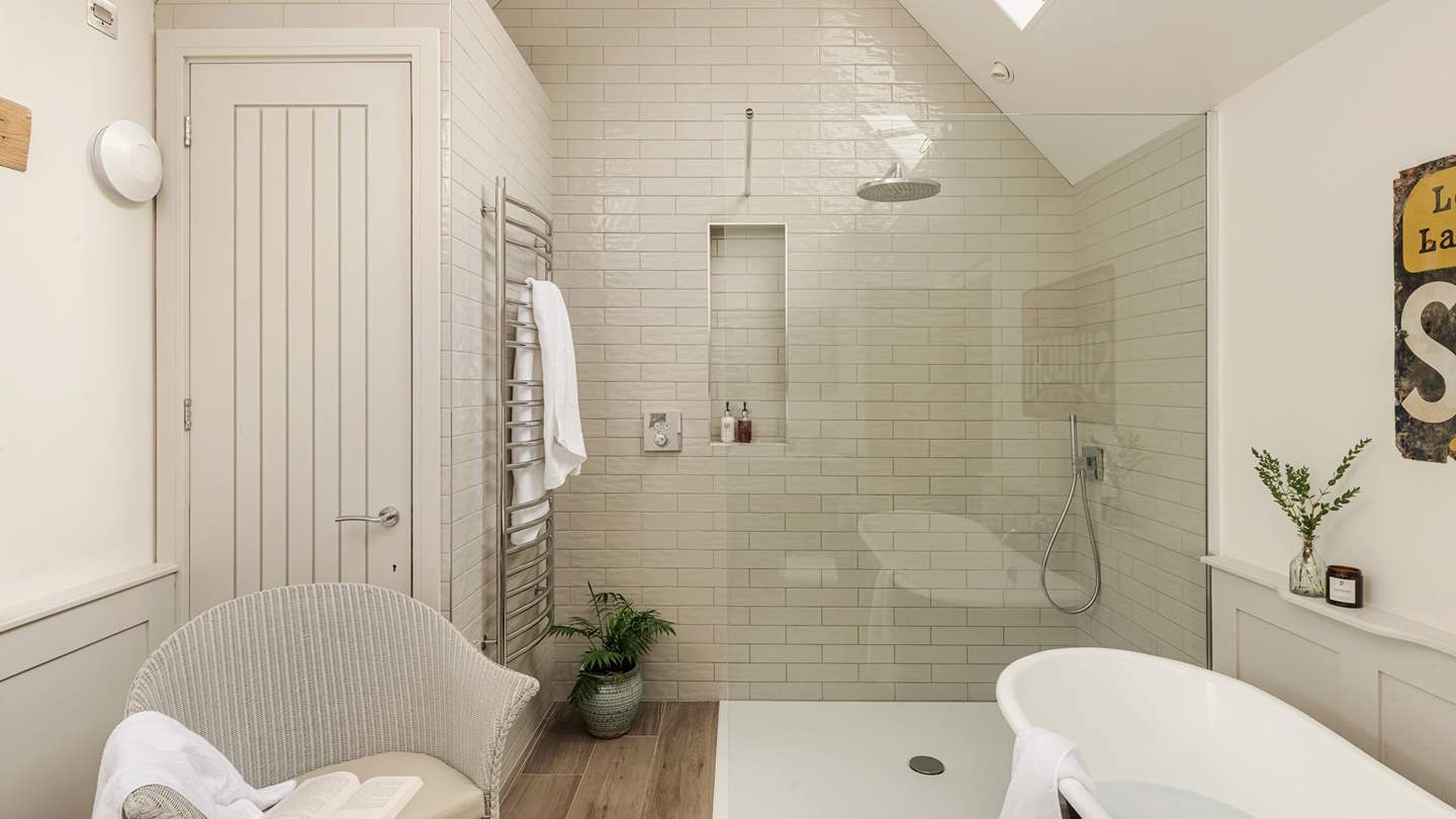 With a walk-in, rainfall shower for rejuvenating morning moments...