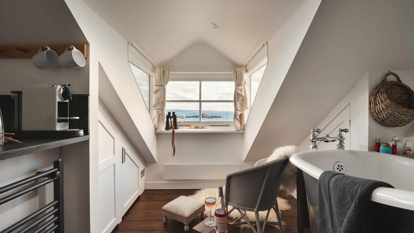 Relax and unwind; take a decadent dip in your slipper bath, with an ocean backdrop and glass of wine in hand