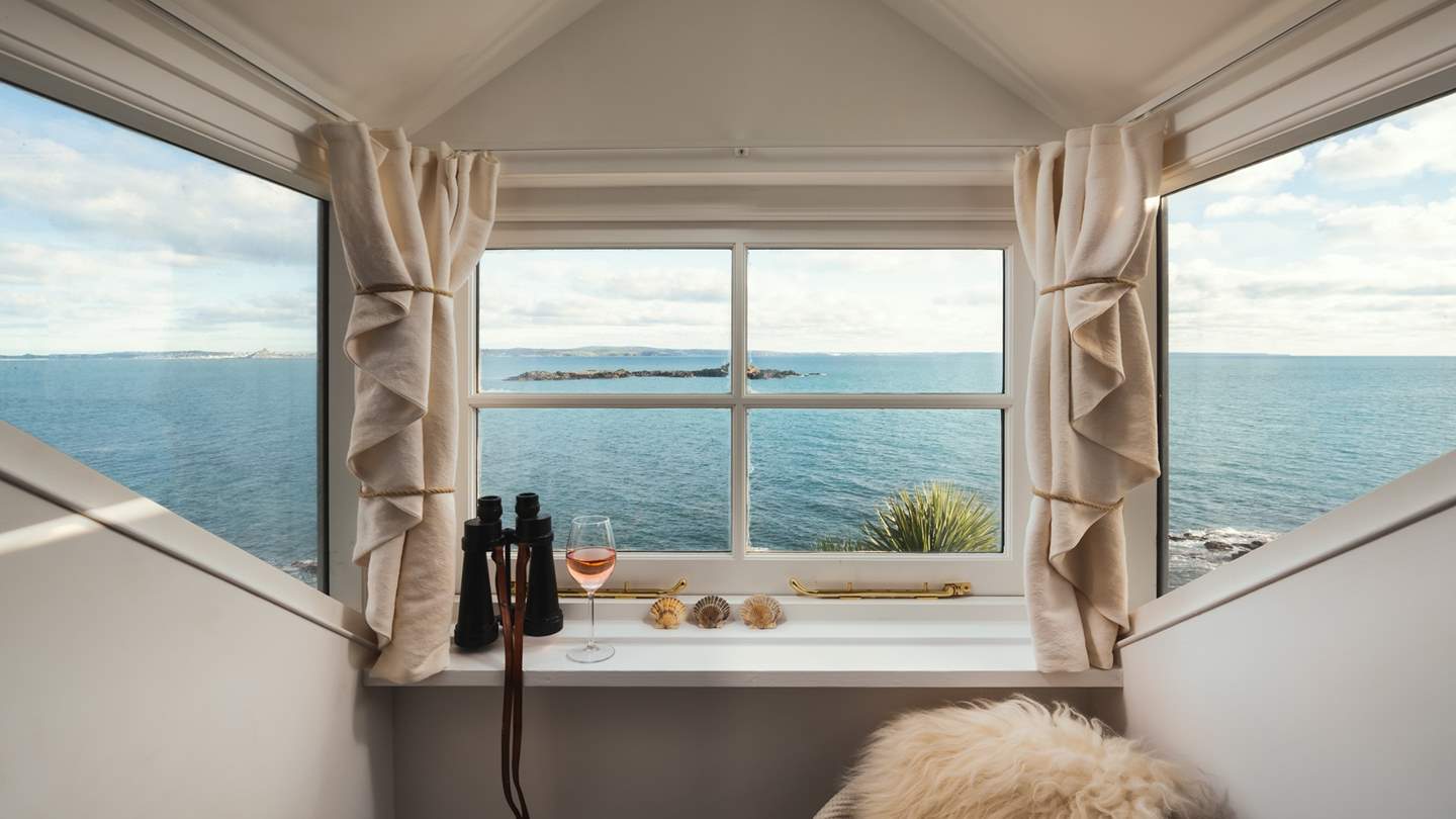 Spy on passing ships with a glass in hand; is there any better way to while away an afternoon?