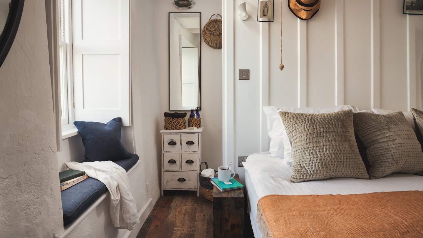 This beautiful bolthole is the dream romantic escape by the sea, complete with snug window seat for wave watching