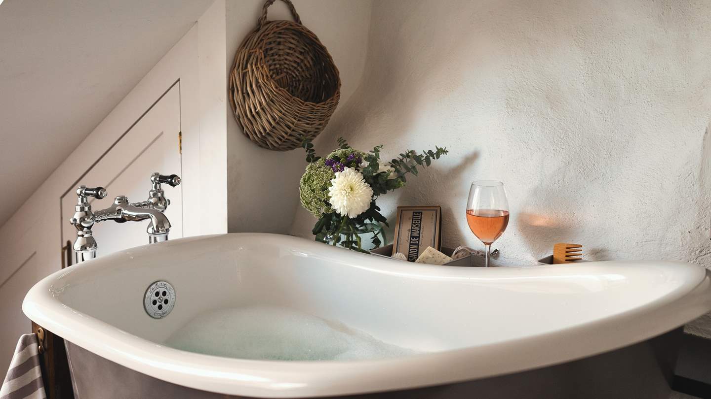 Spend dreamy evenings in the slipper bathtub at Rocksalt, the perfect addition to this romantic bedroom...