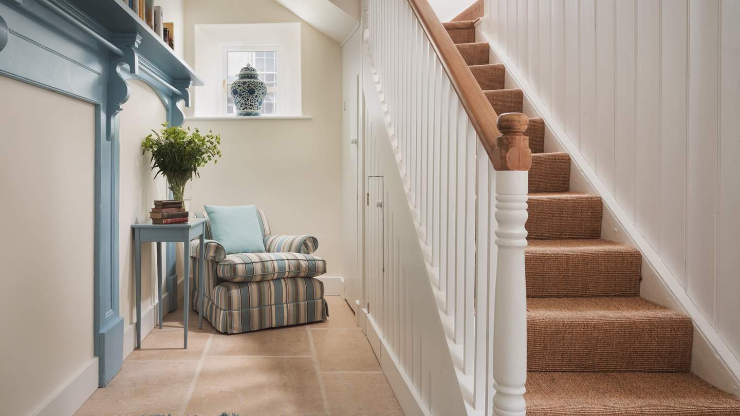 Stairs lead up to the bedrooms