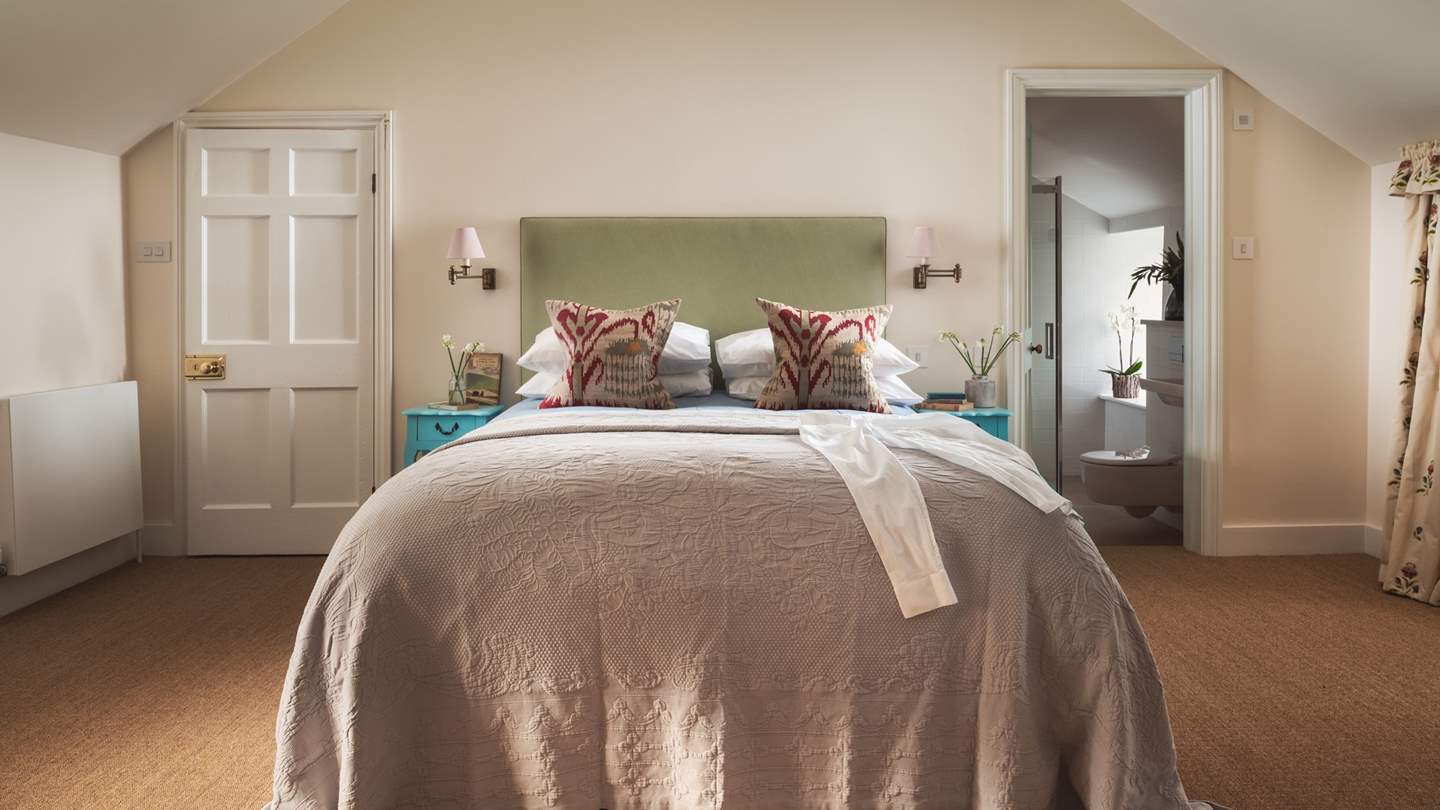 The partially vaulted ceiling makes this a spacious, airy room