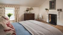 Bedroom one is beautifully furnished with king size bed and en suite shower-room