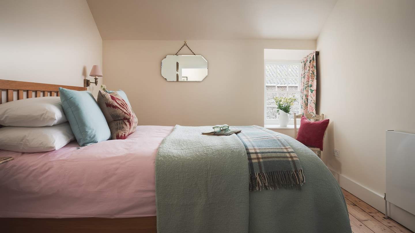 Bedroom two is a cosy space with king-size double bed