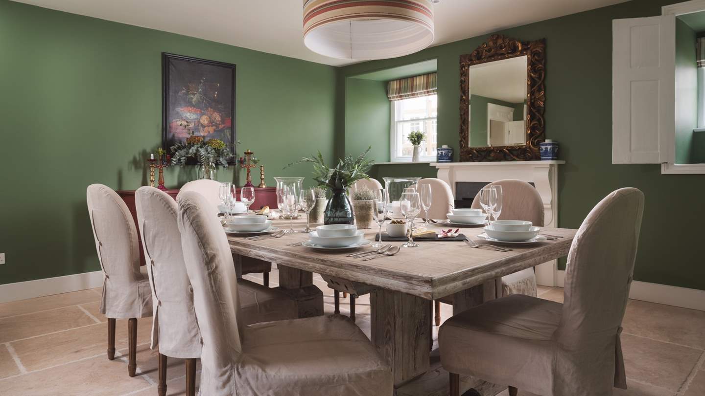 We adore the elegant dining room perfect for family feasting, adorned with vintage touches and antique treasures