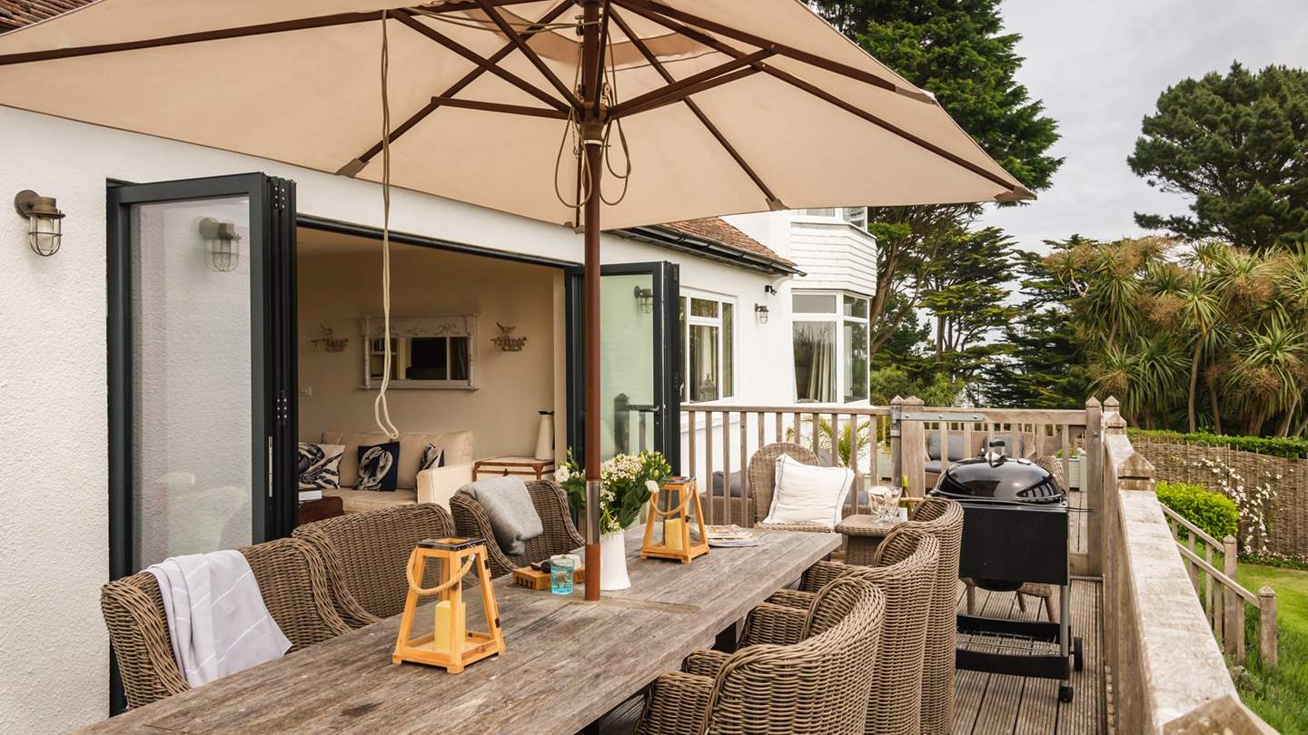 The upper deck level becomes an al fresco dining room on balmy days, complete with a barbeque.