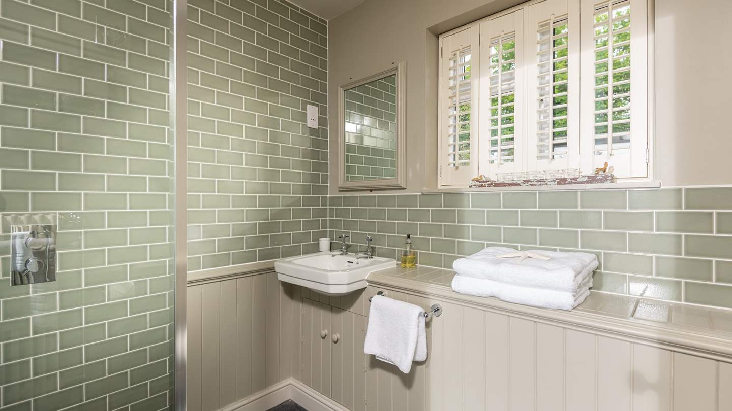 The master bedrooms' en suite wet room, kitted out with a drenching power shower.