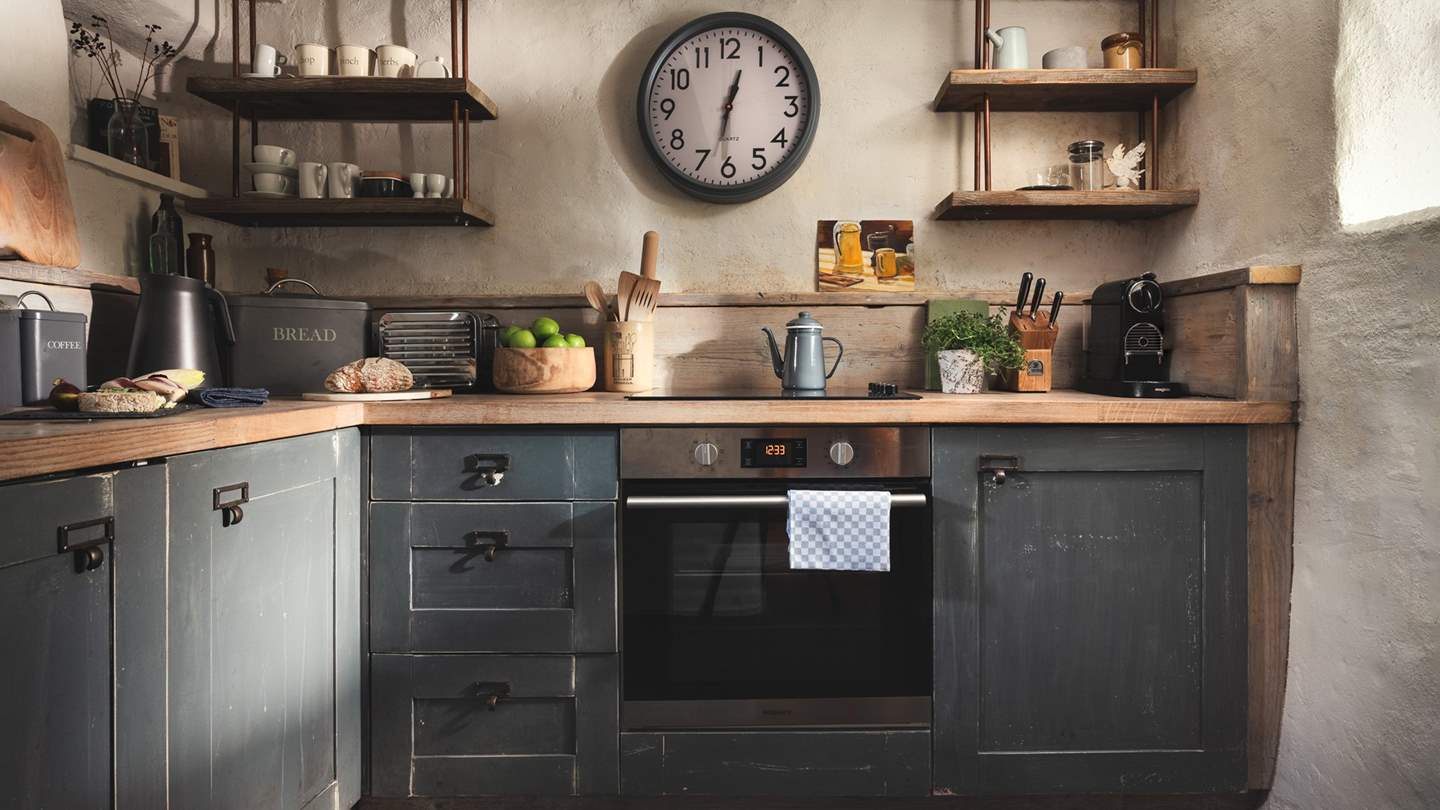 The kitchen is equipped with every mod con