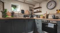 The pretty cottage kitchen has everything you'll need to rustle up meals