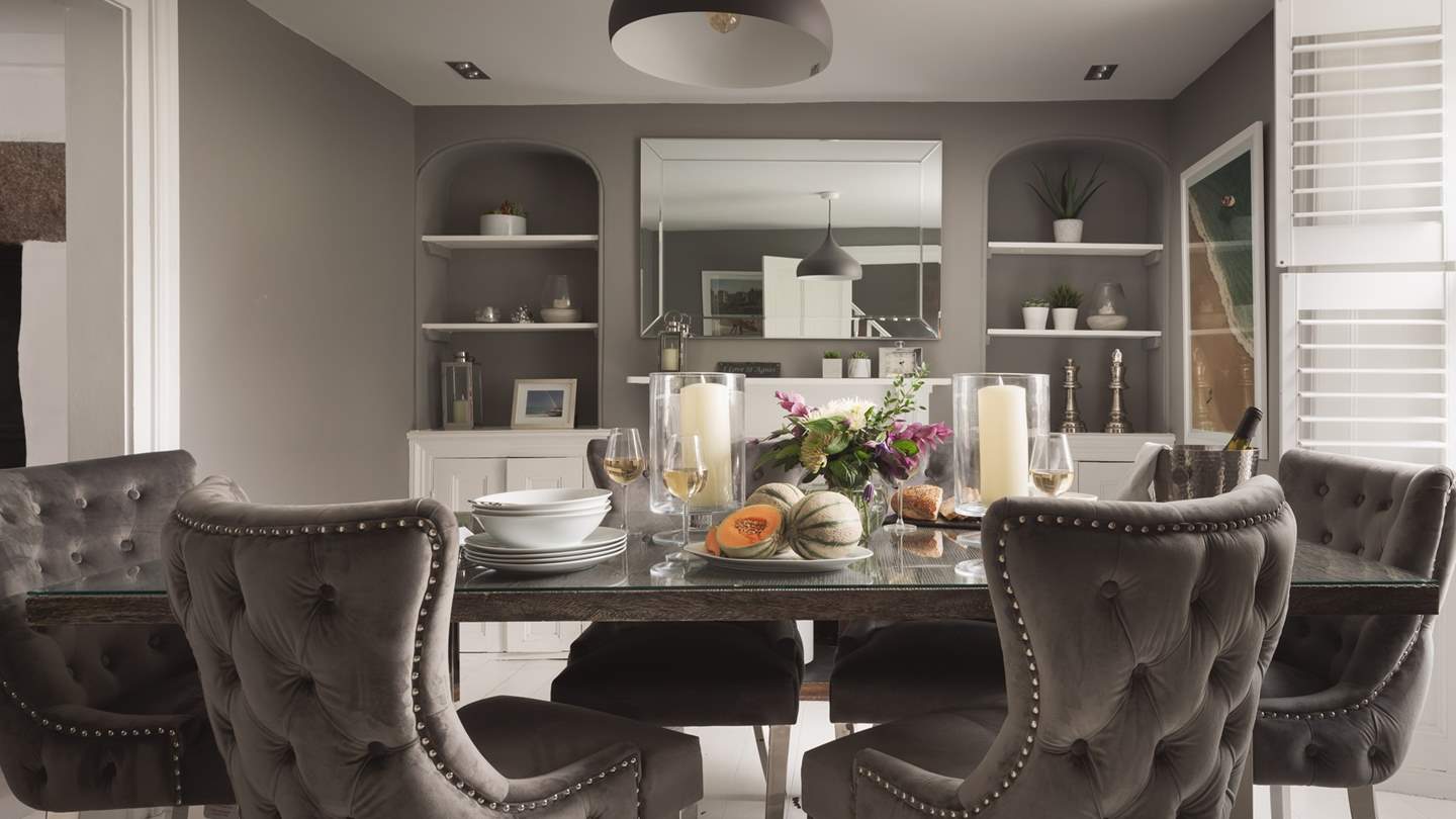 We love the original features and the calm grey colour scheme - the perfect setting for late-night dinner parties or long luncheons