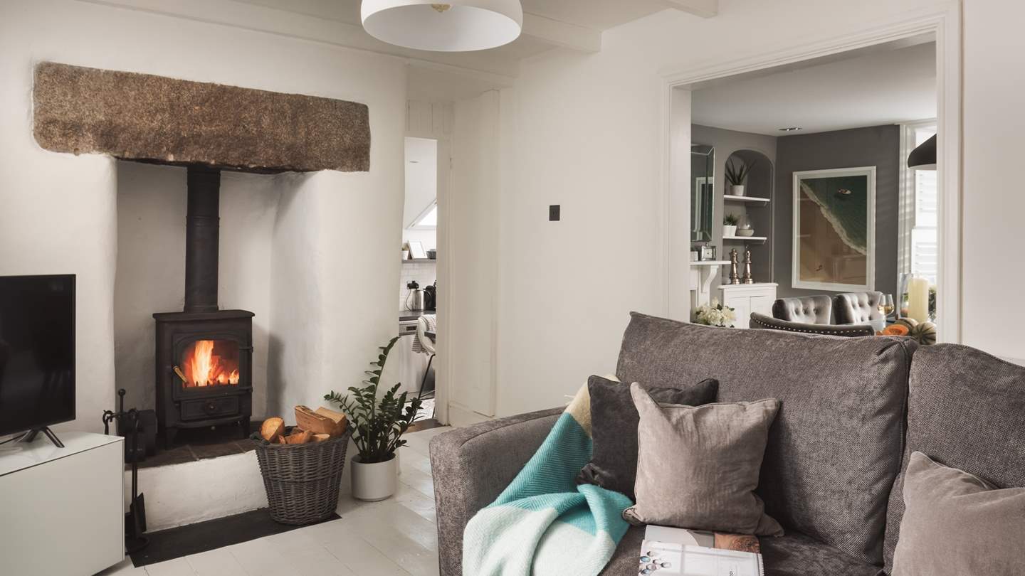 The simple, clean tones of grey and white contrast nicely with the super-cool artwork with a beachy theme, making this a peaceful, laid-back pad