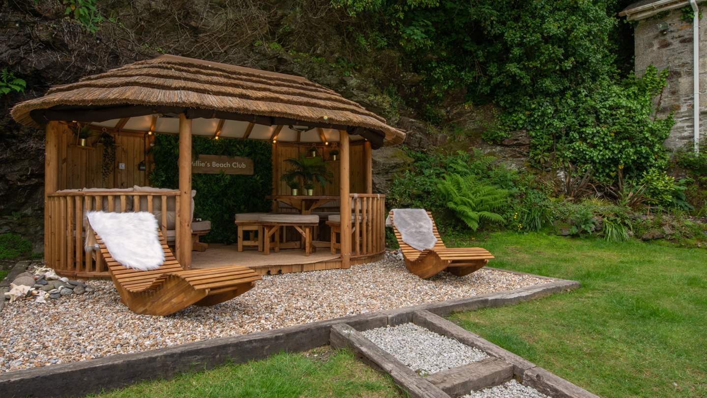 Settle into the comfiest seating area inside Millie's Beach Club, amidst strings of pretty bulb lights and a cosy, boho-chic style...