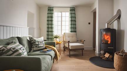 The cosy sitting room is just perfect to relax in at the end of a busy day exploring