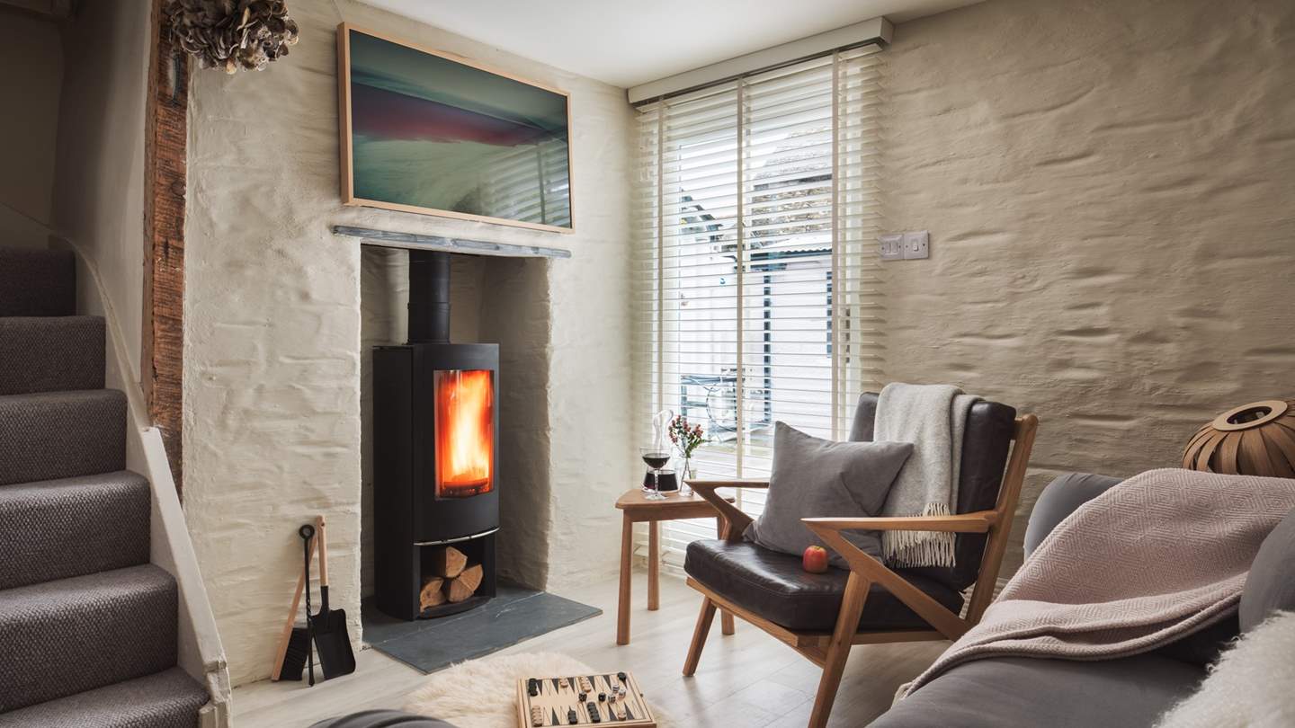 Snuggle around the large wood burner on cool nights - bliss!