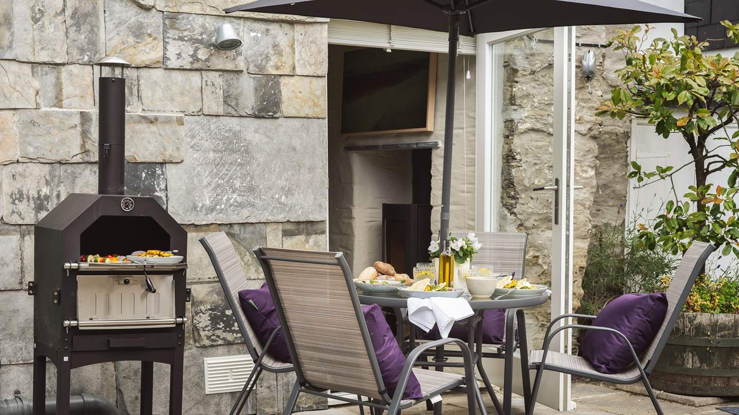 This delightful shared courtyard is perfect for a spot of alfresco dining.