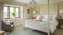 Woodbine' is gloriously pretty with a super king size colonial four poster bed 