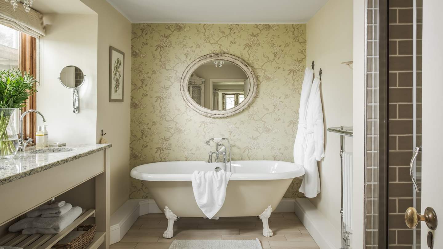 'Woodbine has an en suite has views over the orchard, an exceptional roll top bath and a large walk-in shower