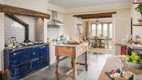 The gorgeous kitchen is a culinary delight, whether you're a honed expert or a budding chef