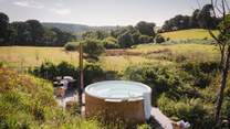 For soothing soaks under cosmic skies, a wood fired Swedish Skarsguard hot tub is most enchanting addition