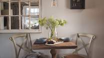 There's a darling dining table tucked away in the sitting room for romantic meals tête-à-tête