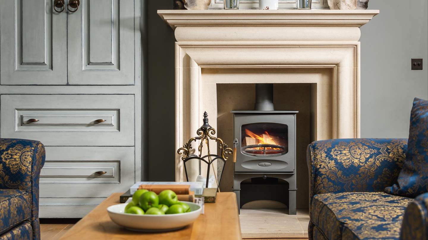 The luxurious sitting room is just the place for long chats or just a snooze by the fire