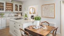 The gorgeous kitchen and breakfast room is the perfect space to come together