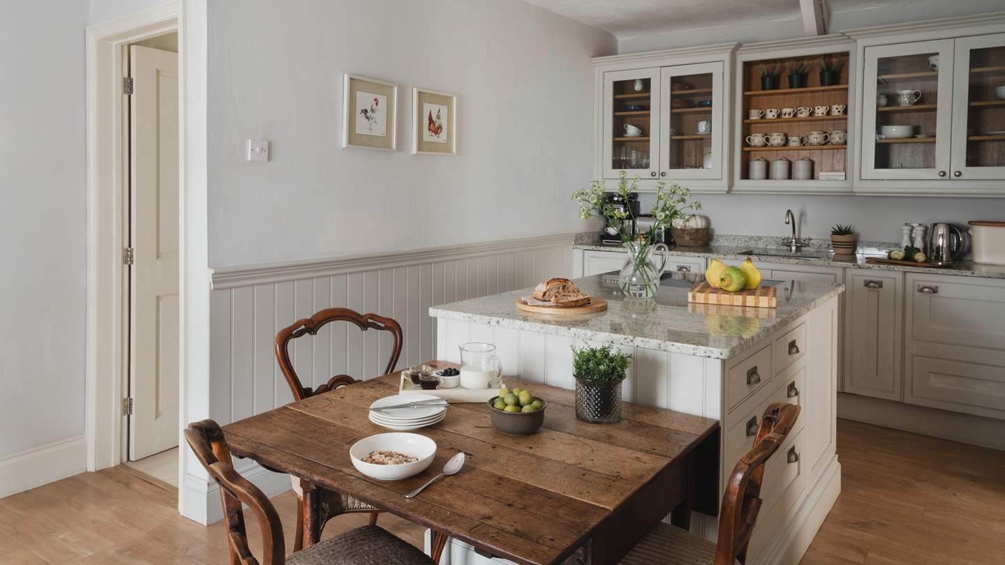 You'll find a dining table here too, or dine alfresco on the private terrace in the warmer months 