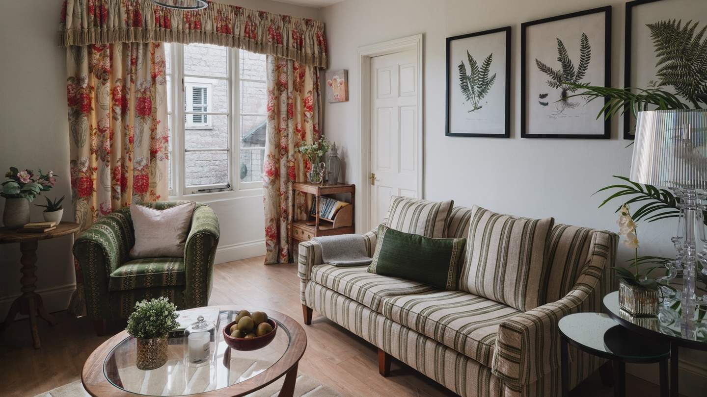 With a comfy sofa plus two occasional chairs, there's space for everyone to come together 
