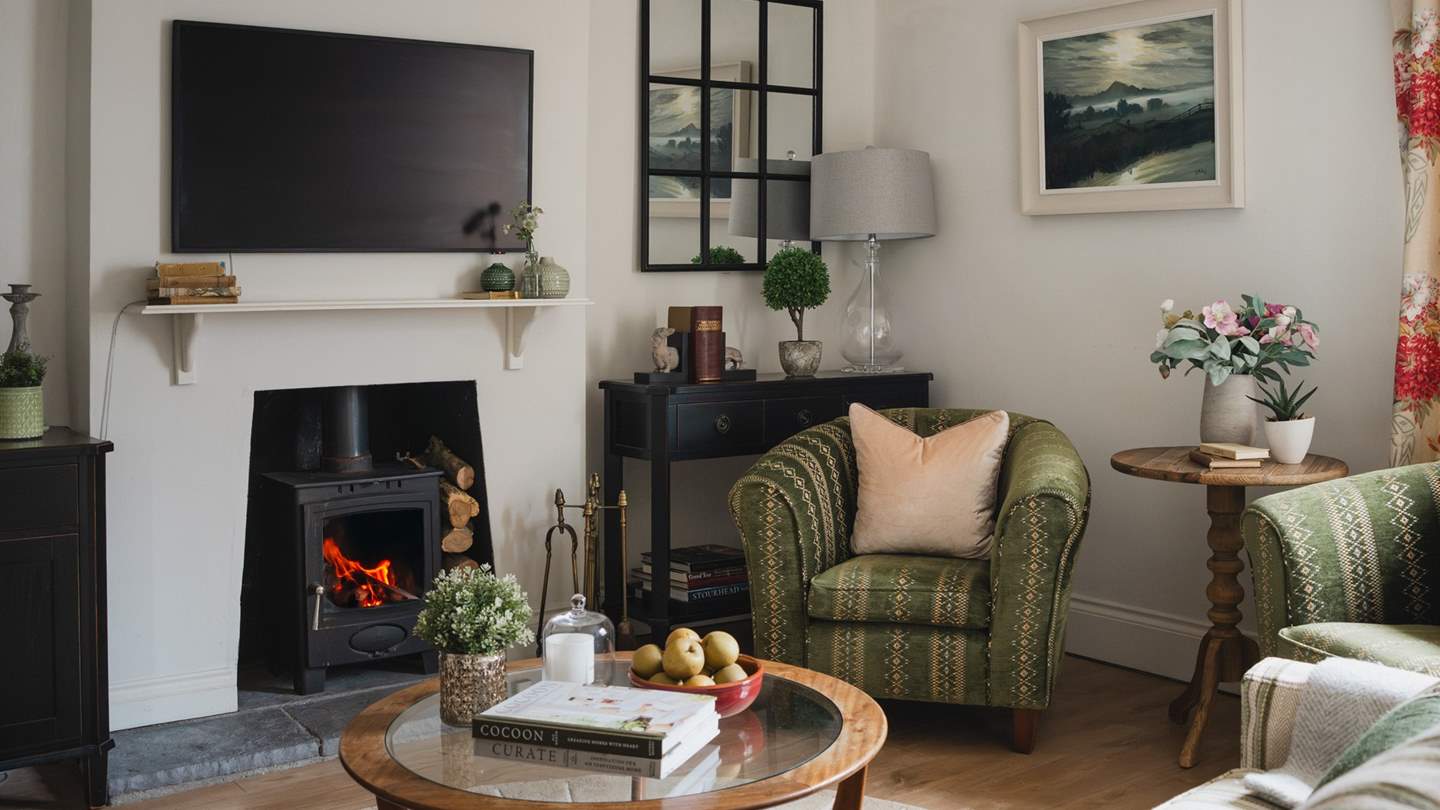 A dream in every season, the cosy downstairs sitting room is a cocoon of comfort and calm