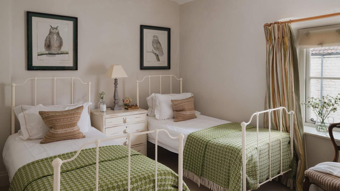The second bedroom has 3ft wrought iron twin beds and are perfect for little ones