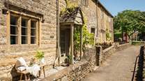 Nestled in the heart of the Cotswolds, this 16th century swoonsome limestone cottage is brim-full of character