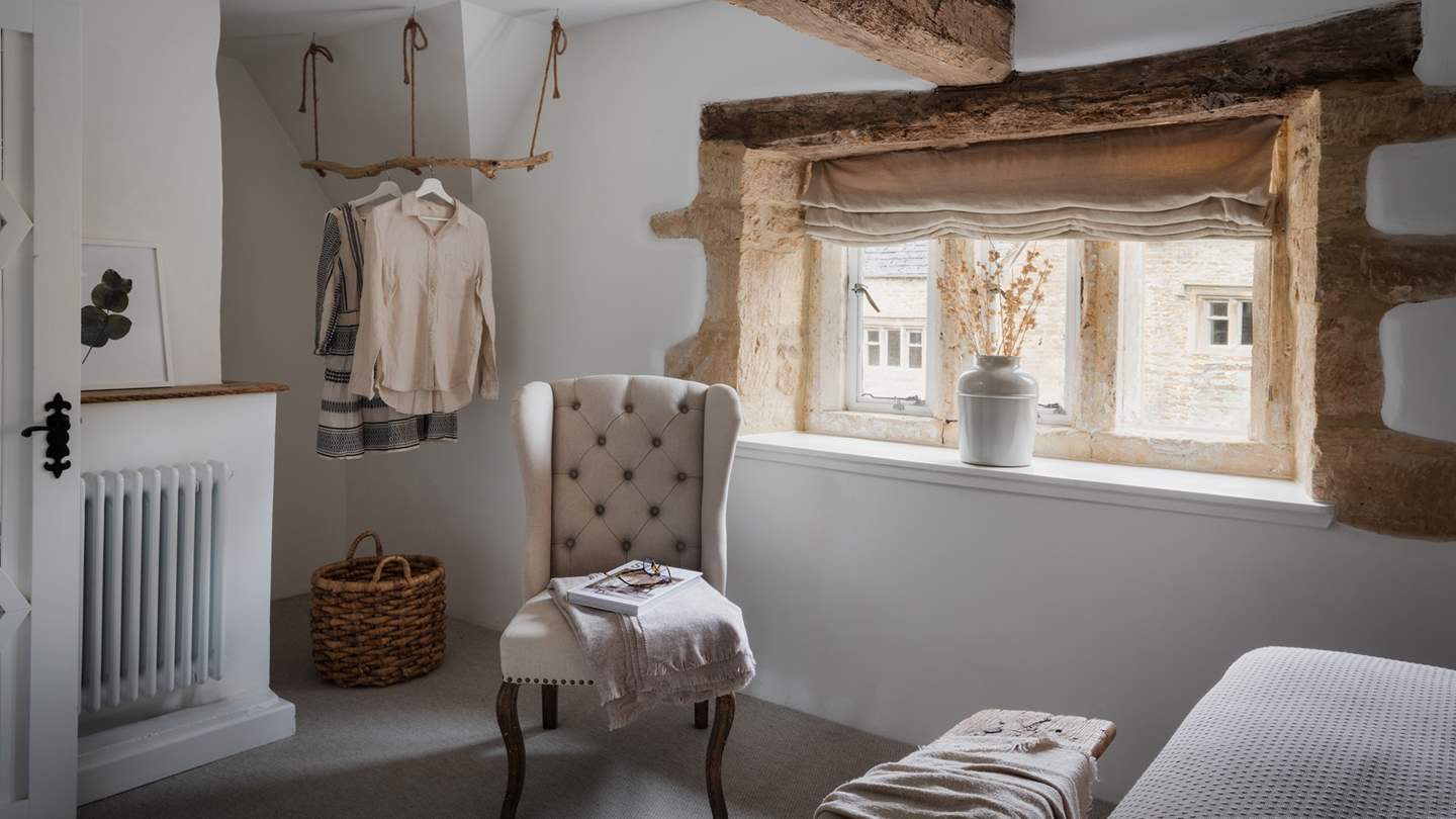 The master bedroom offers endless cottagecore charm