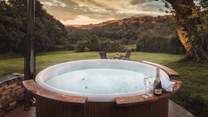 Step in to the luxurious Skargards hot tub from Sweden and watch the twilight descend over the trees