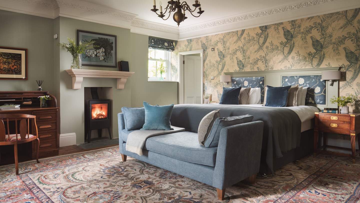 The master bedroom is just exquisite, with its own wood burner for extra cosiness