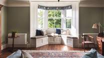 We have fallen in love with the bay window seat in the master bedroom with tranquil countryside views