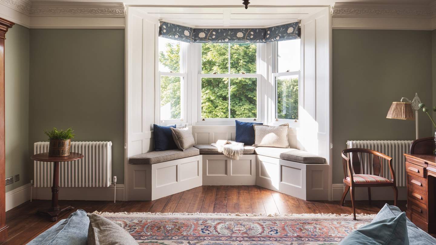 We have fallen in love with the bay window seat in the master bedroom with tranquil countryside views