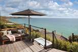 With gorgeous views over Whitsand Bay, there's a hot tub too