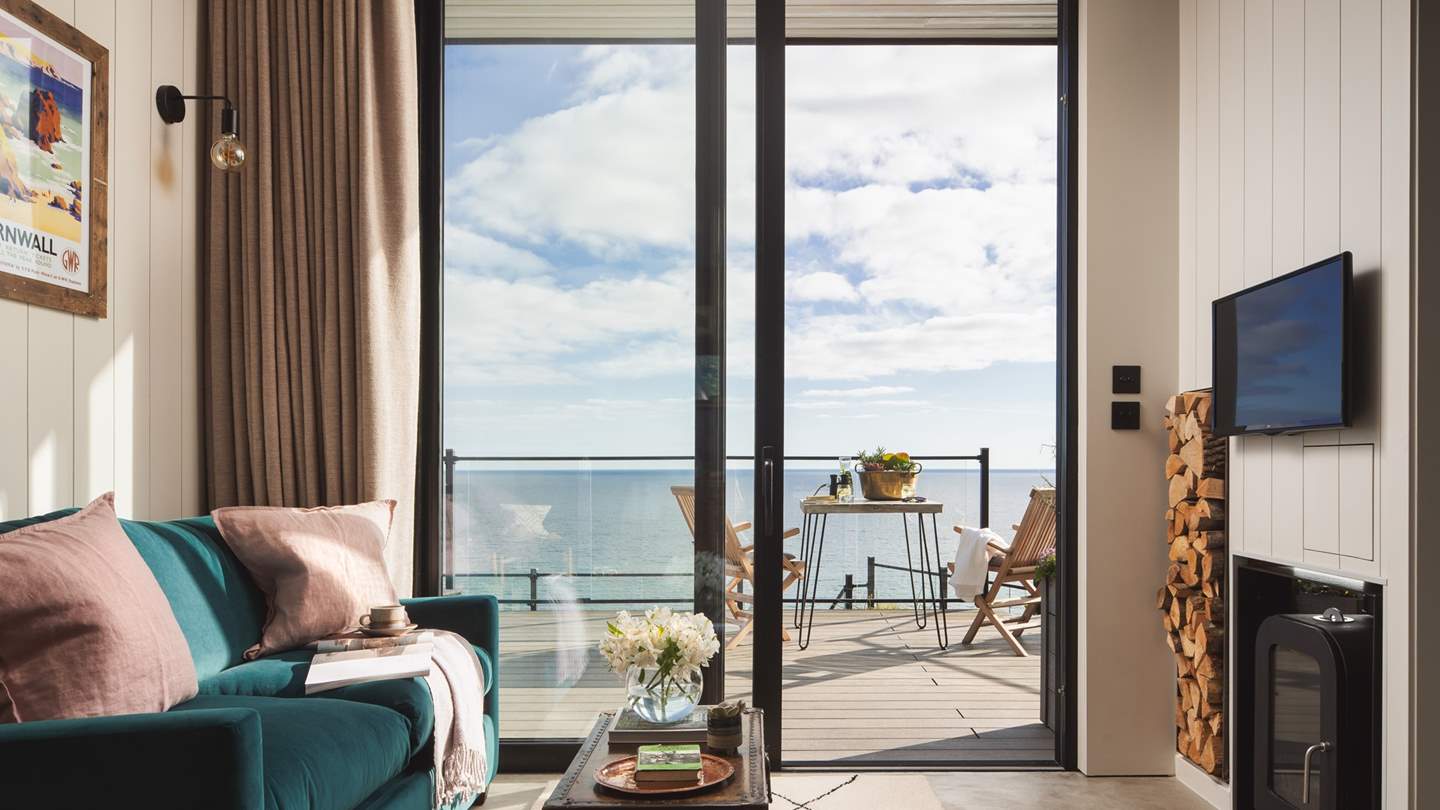 Huge glass doors mean you'll have amazing views even when you need to stay cosy warm