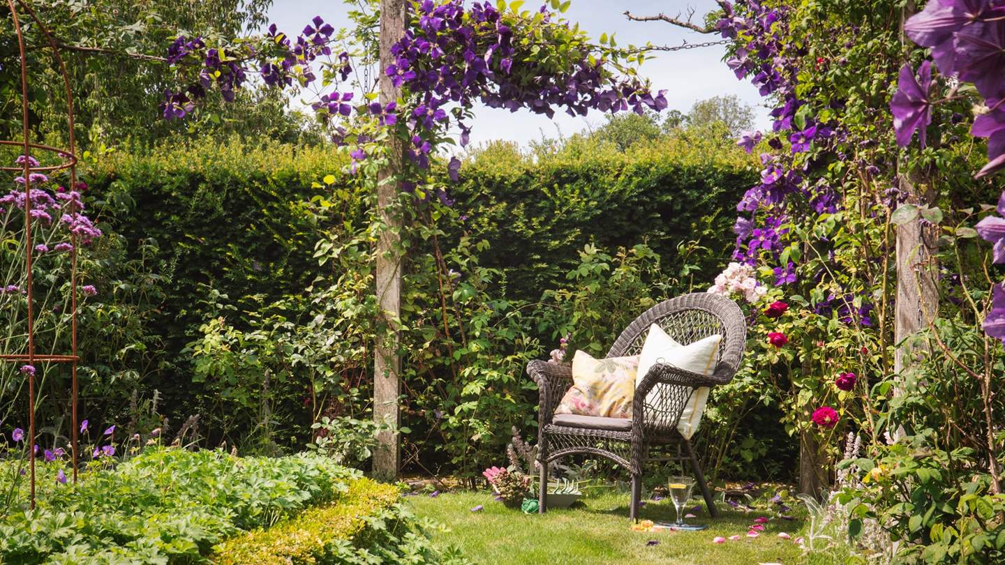 The dreamy garden is resplendent with flowers