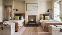 Downstairs, you'll find a final bedroom - just perfect for flexible sleeping arrangements