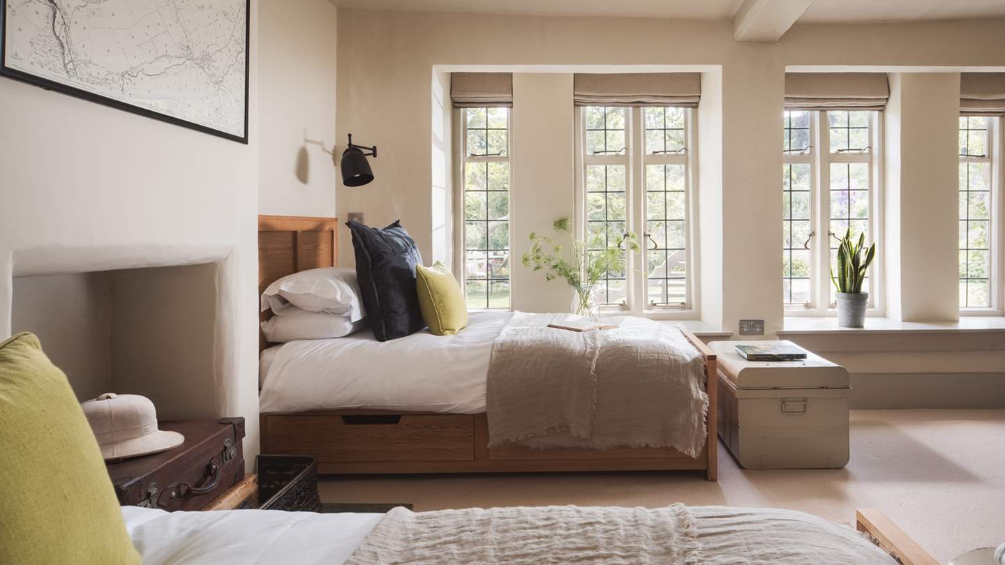 Extraordinarily bright with large windows and neutral tones, this downstairs bedroom is simply a dream... 