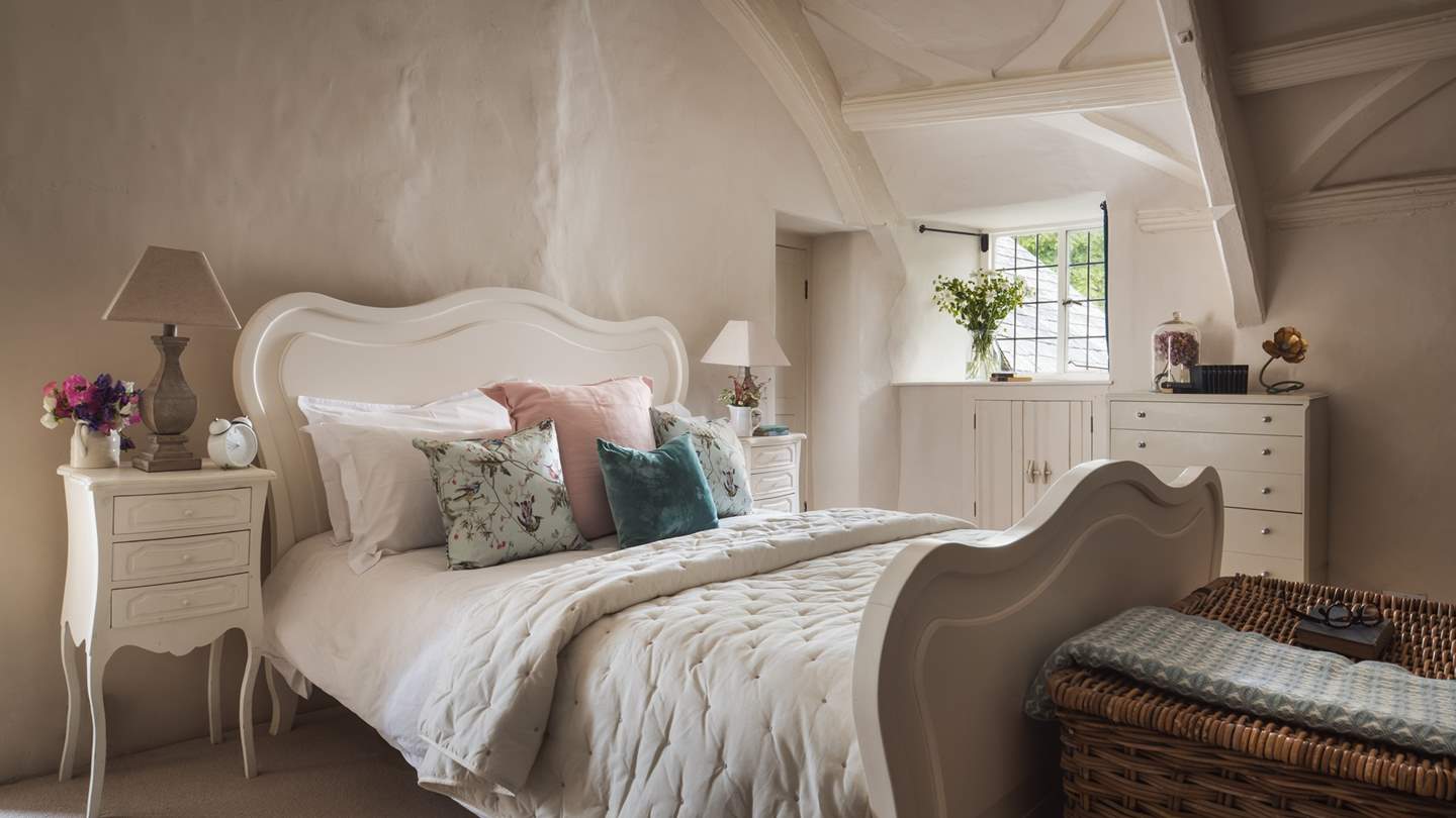 This bedroom has its own dressing room with plenty of cupboard space and an en suite