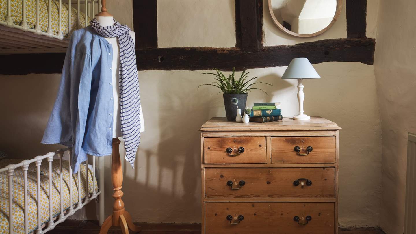 We adore the rustic interior touches in the bunk bedroom