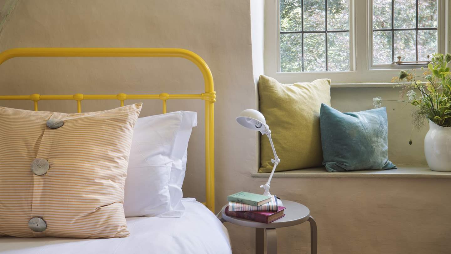 Gorgeous sunshine yellow makes this room perfect for little ones