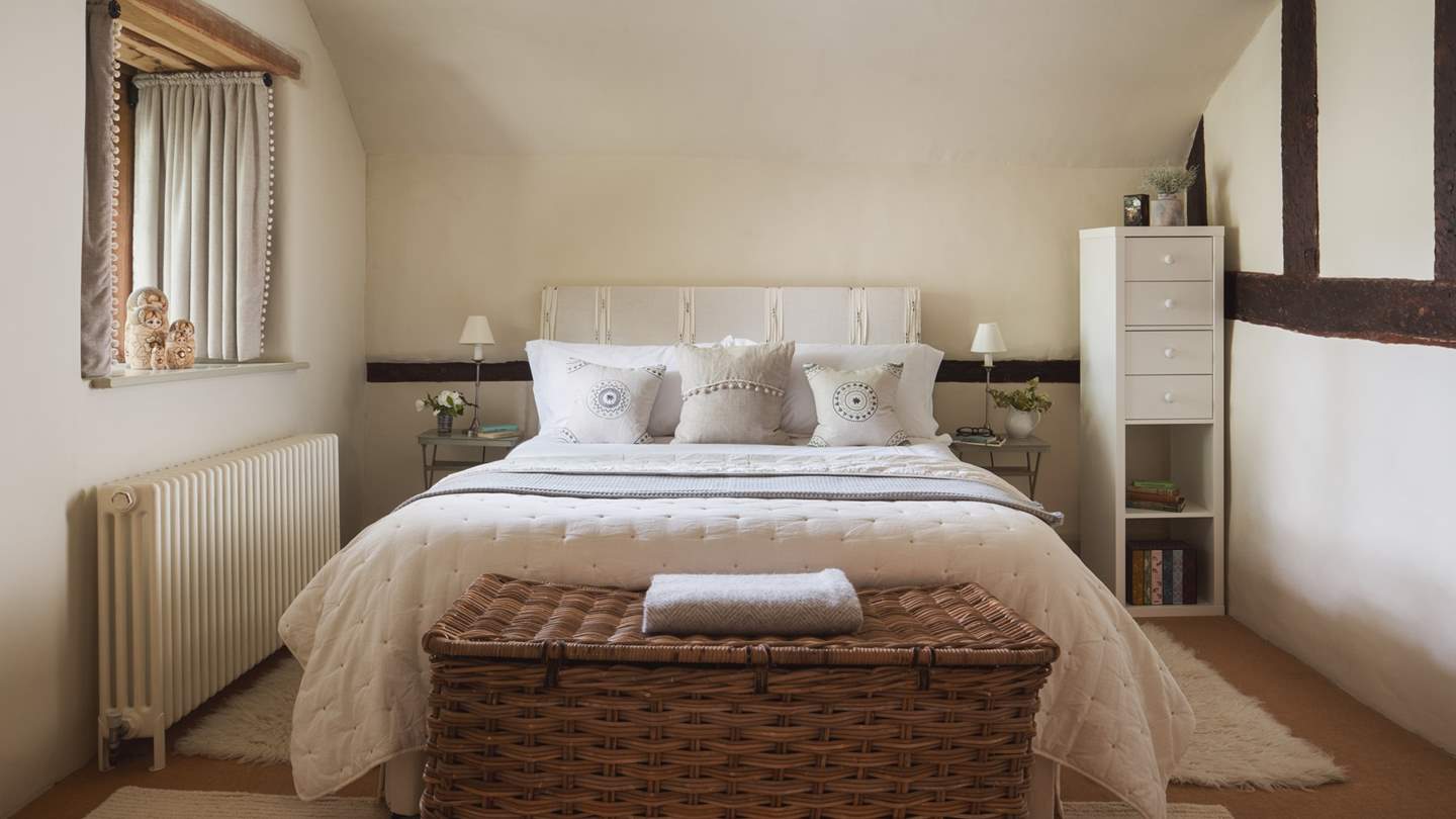 The fifth bedroom in chic cream tones is effortlessly elegant