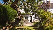 Apple Tree Cottage is nestled in the heart of the pretty village of Gweek at the head of the Helford river